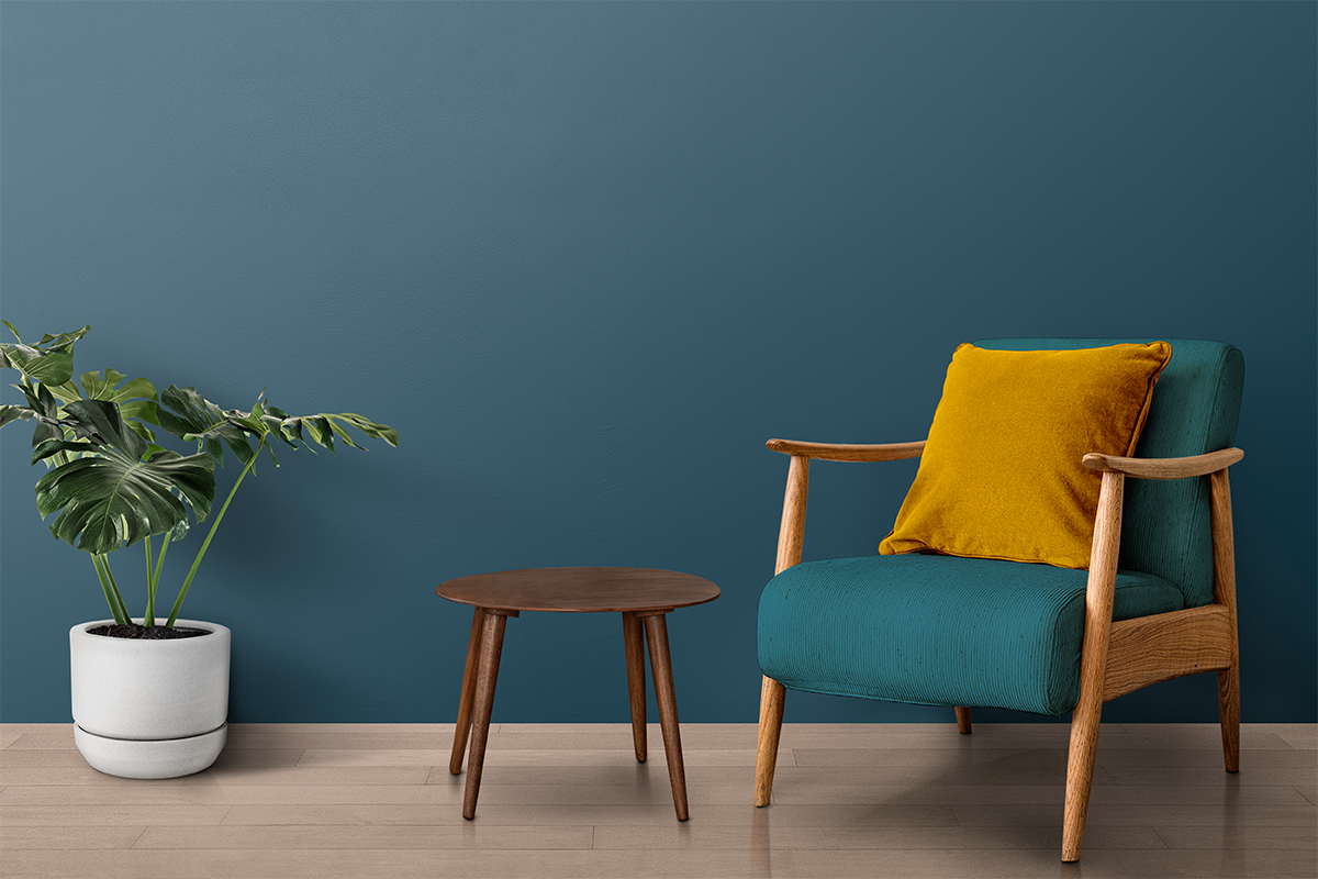A wooden chair set with a table in a modern living room setting, featuring clean outlines and realistic shadows thanks to clipping path service.