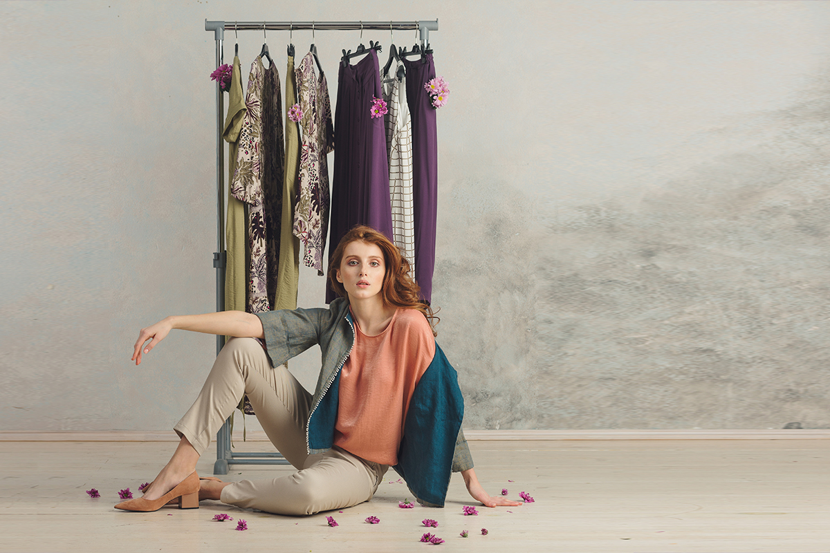 Garment & Apparel Product Photo Editing Service, A confident fashion designer model wearing a beautifully crafted dress, showcasing intricate details and elegant design through expert photo editing.