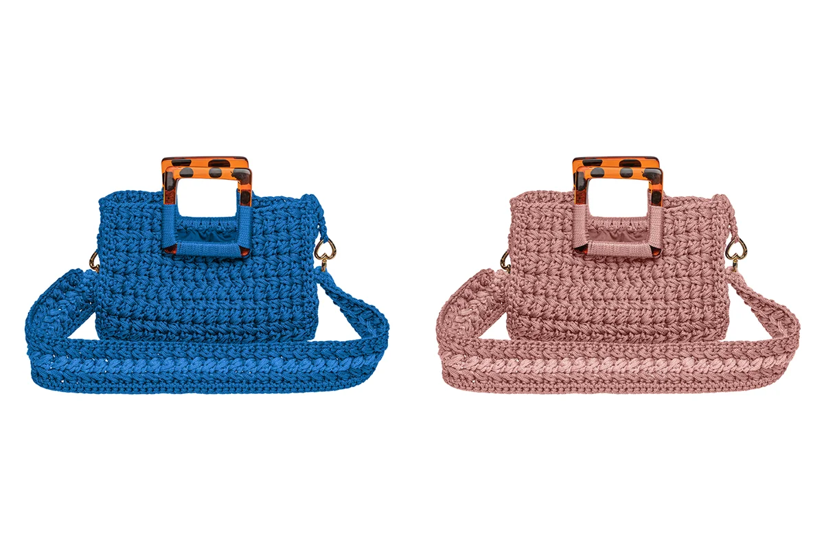 Blue shoulder bag undergoes a dramatic transformation to a vibrant pink hue after color